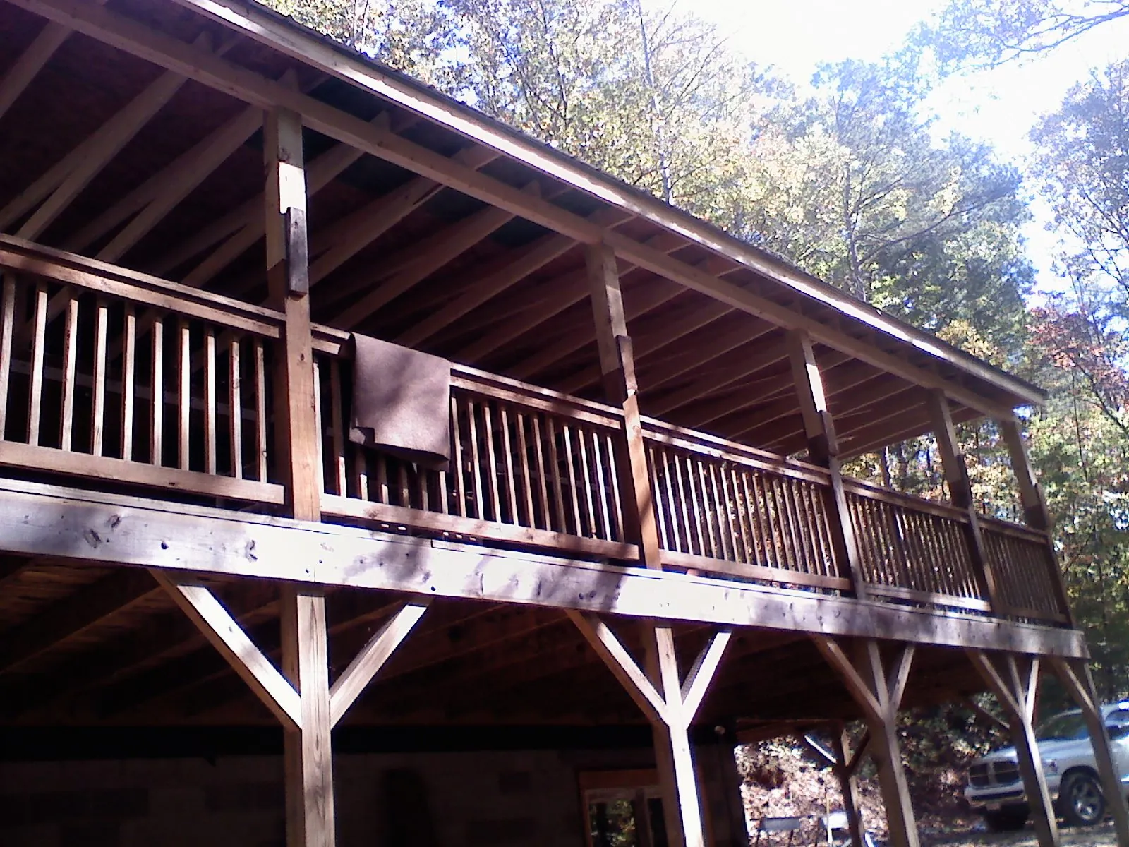 Timber framing under a new elevated porch and deck — Roof Leak Repair in Water Mill by Roofing Brothers